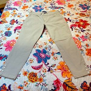 Light tan, lisbeth crop pant with snaps at the ankle.